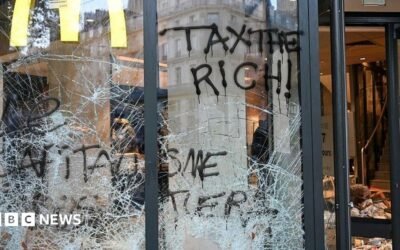 Burnt out cars and shattered glass on Paris streets after protests turn to riots and looting Burnt out cars and shattered glass on Paris streets after protests turn to riots and looting