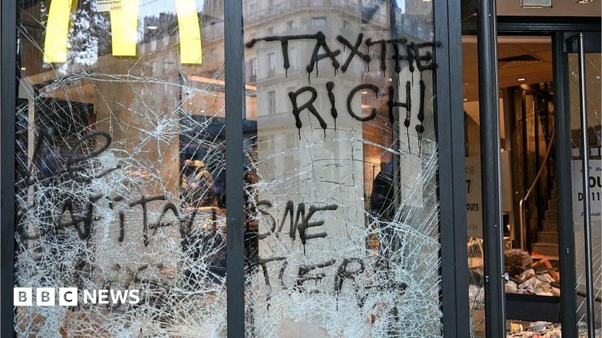 Burnt out cars and shattered glass on Paris streets after protests turn to riots and looting Burnt out cars and shattered glass on Paris streets after protests turn to riots and looting